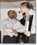 Sagara presenting the bat